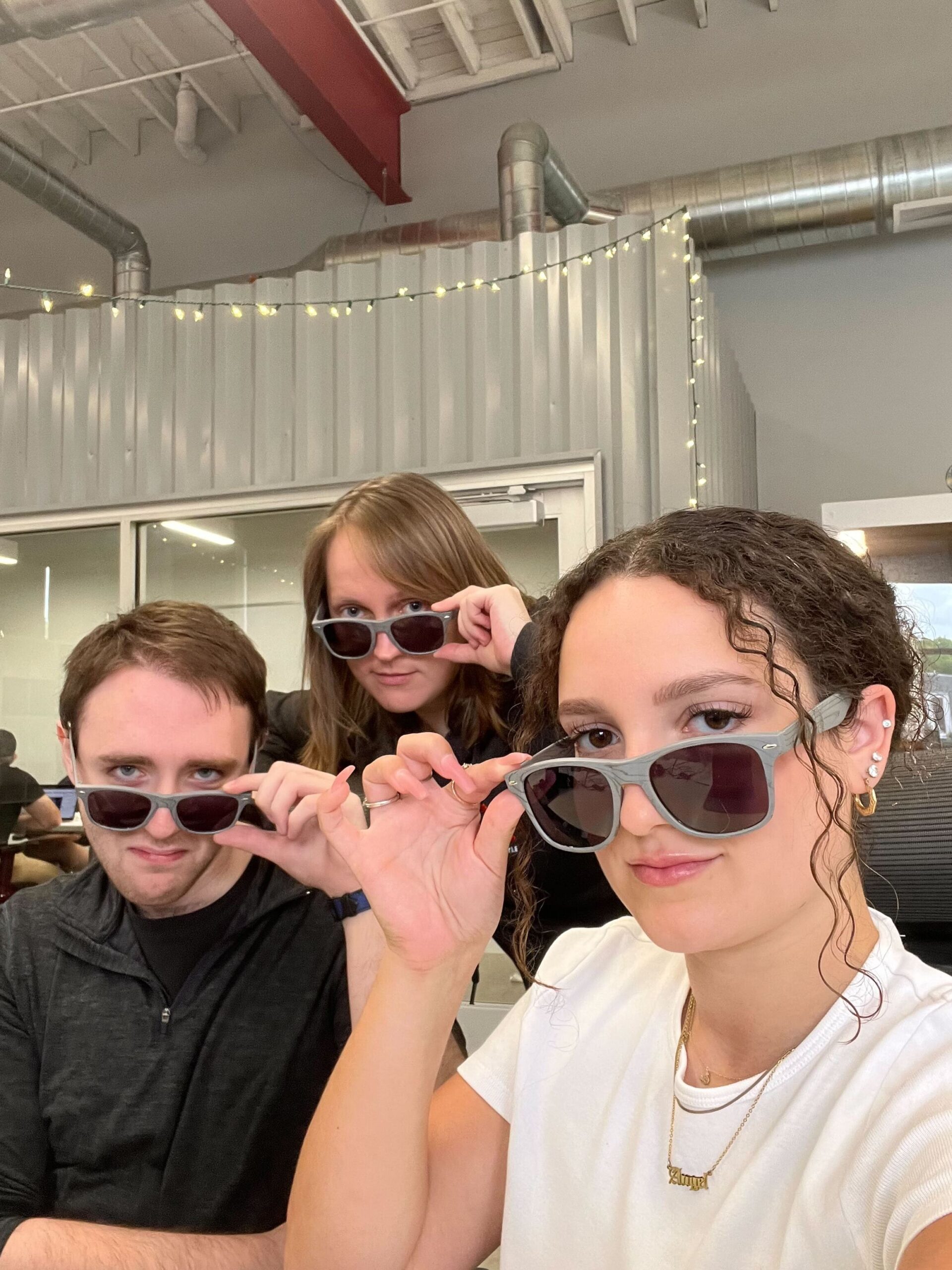 Red Argyler's tipping their Red Argyle sunglasses