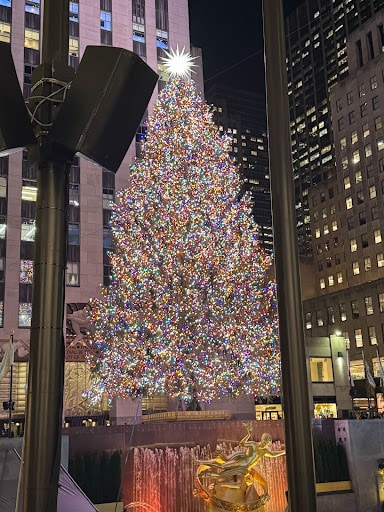 Rockefeller Center in December with the tree with lights.